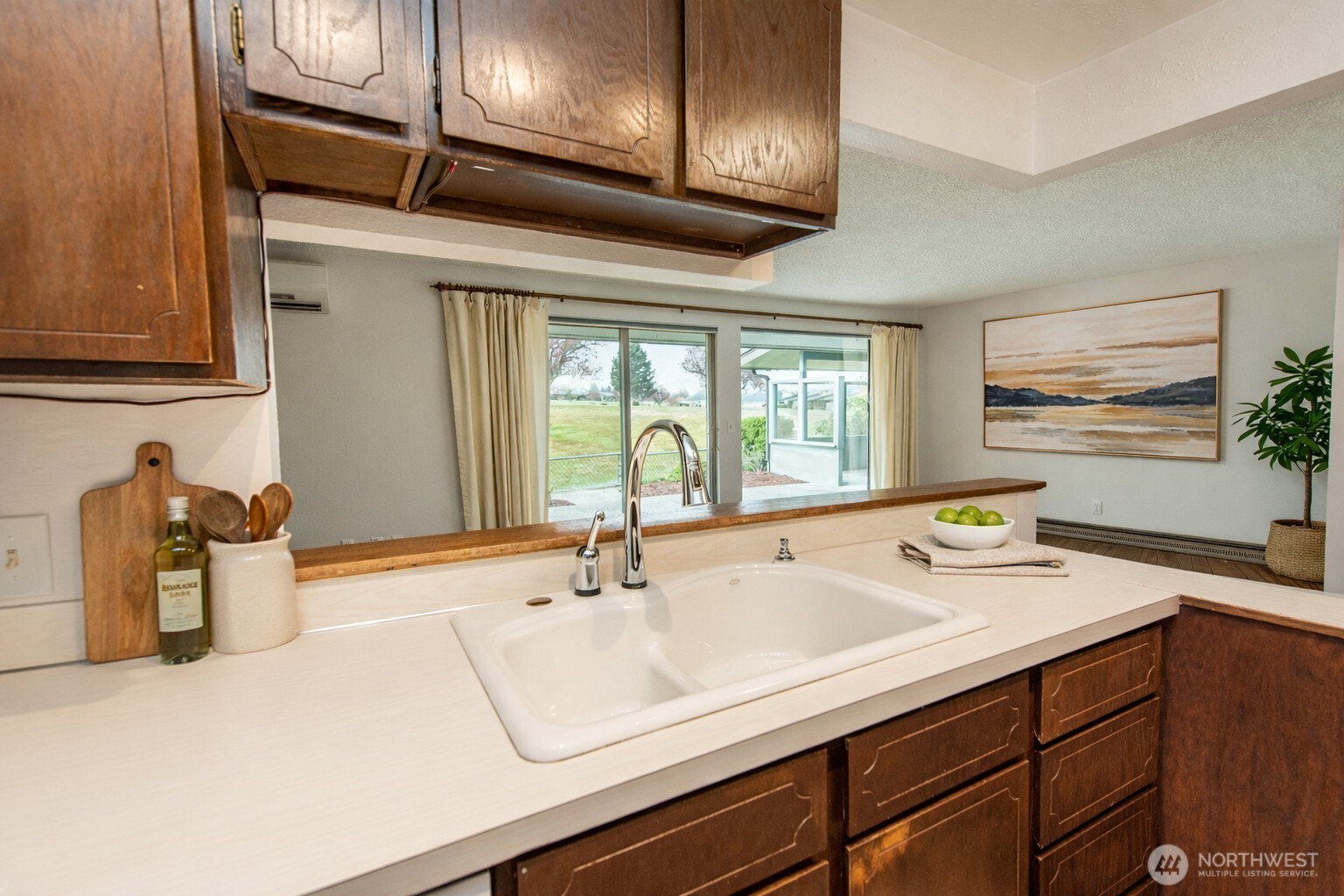 1301 South 3rd Avenue, Unit 19D Sequim, WA 98382 - Photo 12 of 35 a kitchen with a sink and a window