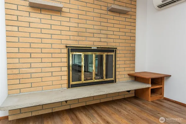 a wooden bench sitting in front of a door