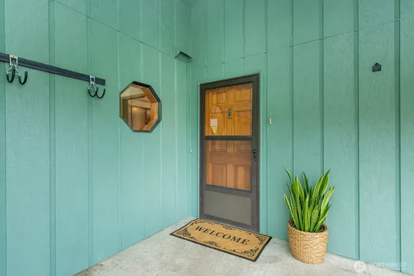 a view of bathroom with a potted plant