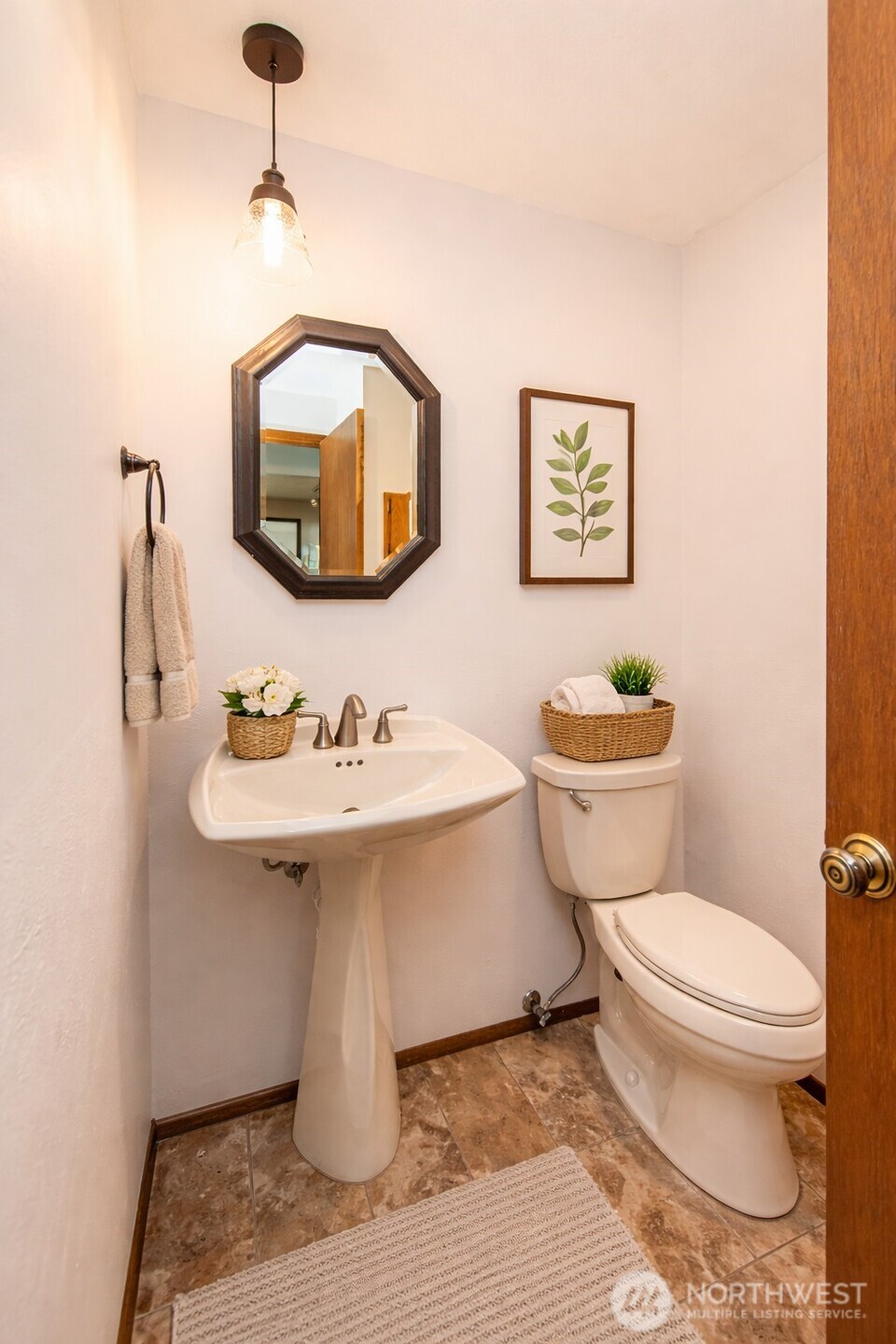 1301 South 3rd Avenue, Unit 19D Sequim, WA 98382 - Photo 21 of 35 a bathroom with a sink a mirror and a toilet