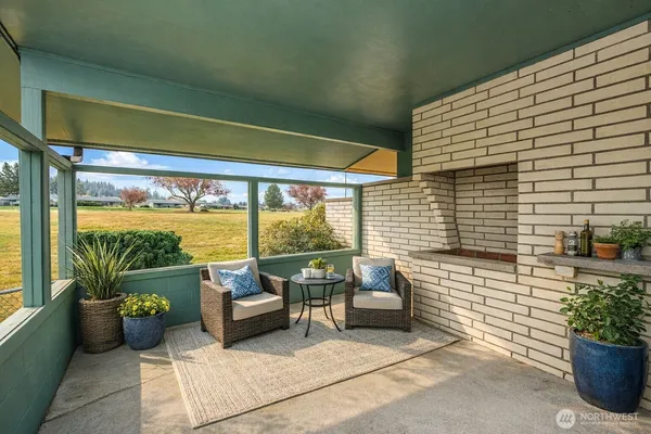 a building outdoor space with patio furniture