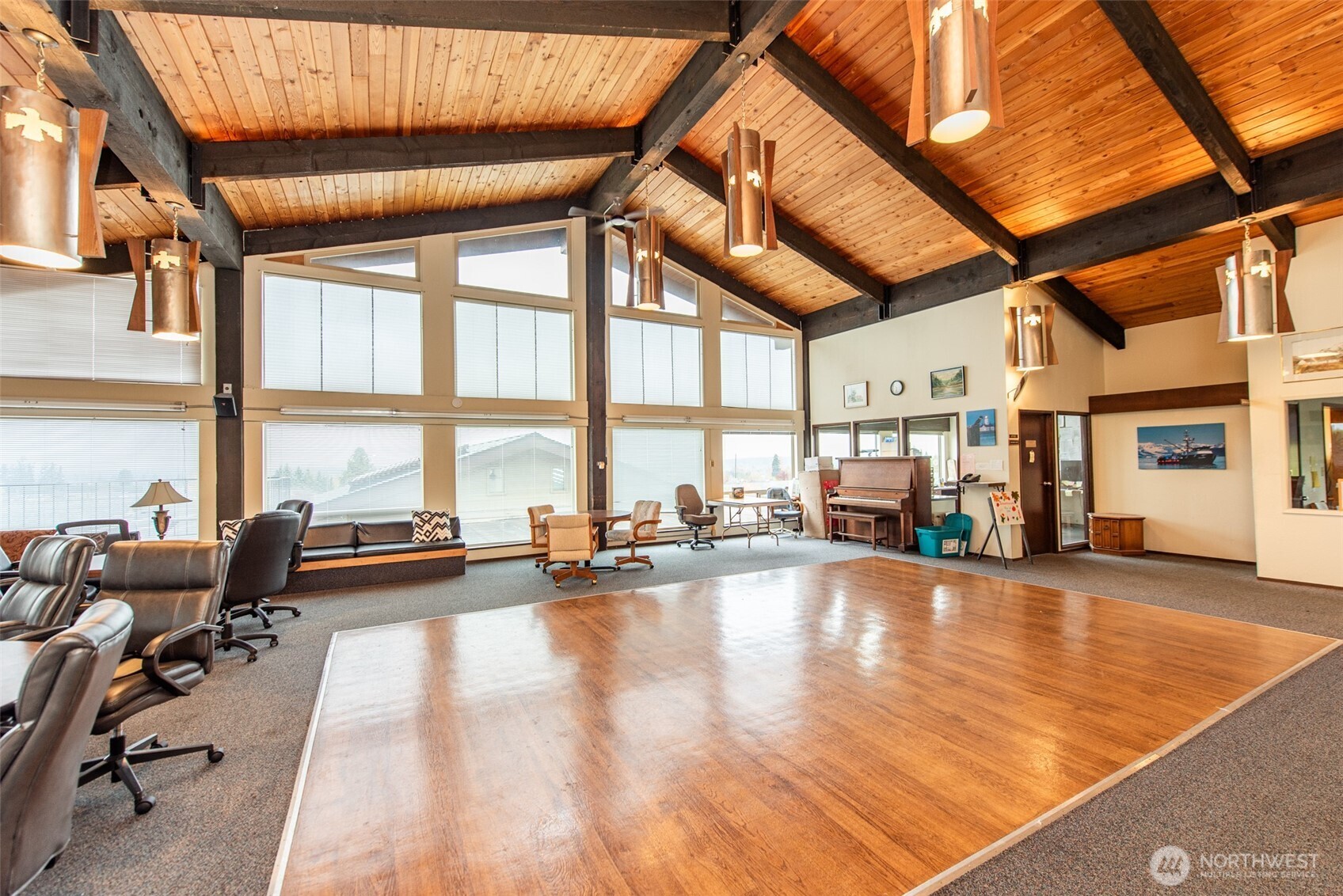 1301 South 3rd Avenue, Unit 19D Sequim, WA 98382 - Photo 31 of 35 a view of pool with furniture and floor to ceiling window