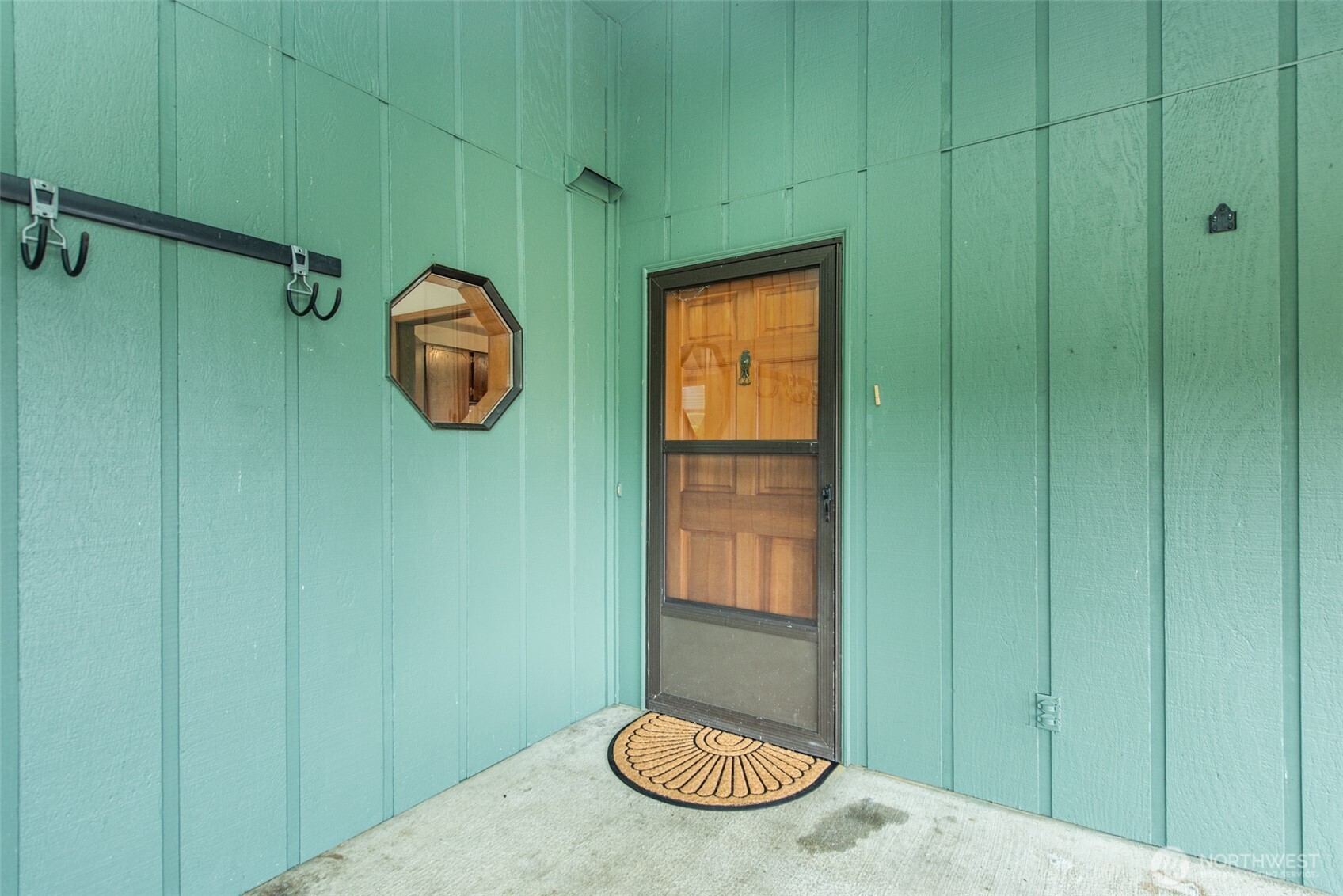 1301 South 3rd Avenue, Unit 19D Sequim, WA 98382 - Photo 5 of 35 a view of a bathroom with a sink and a mirror