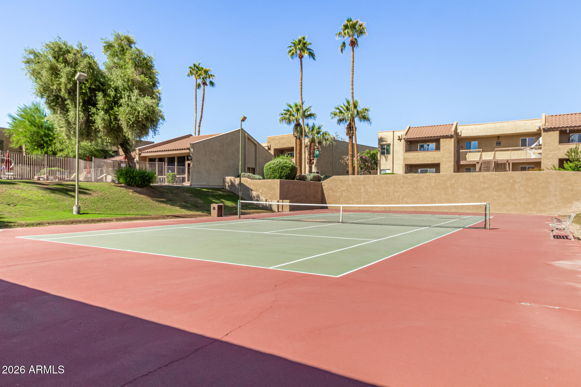 5877 North Granite Reef Road, Unit 1133 Scottsdale, AZ 85250 - Photo 25 of 33 a front view of a building with garden