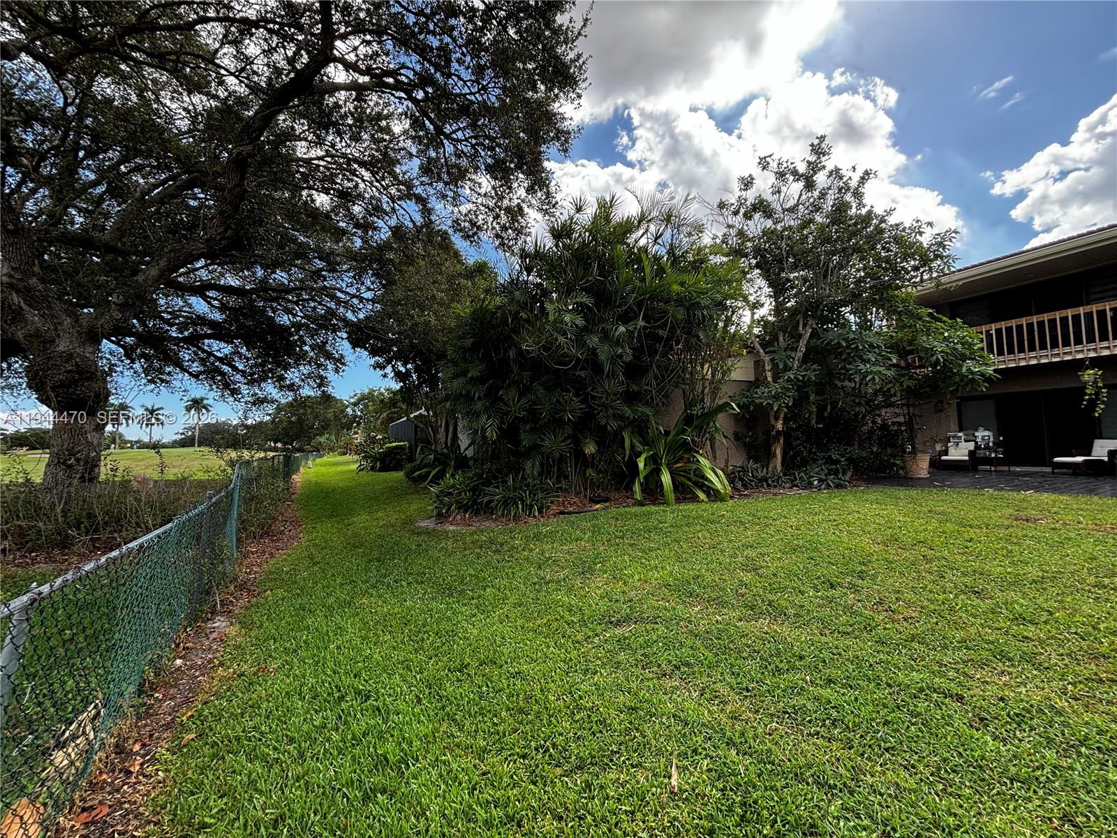2001 St Andrews Road, Unit 121 Hollywood, FL 33021 - Photo 6 of 39 a view of a garden with a fountain