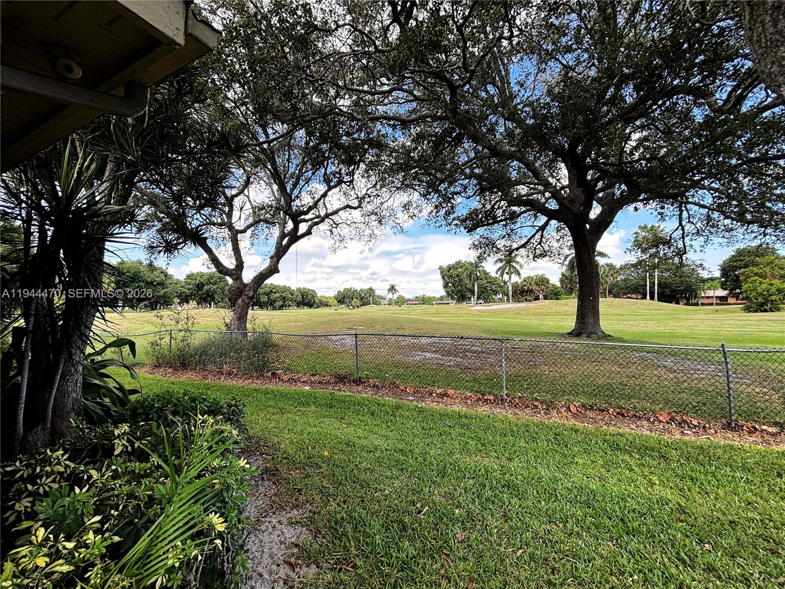 2001 St Andrews Road, Unit 121 Hollywood, FL 33021 - Photo 10 of 39 a view of lake with green space