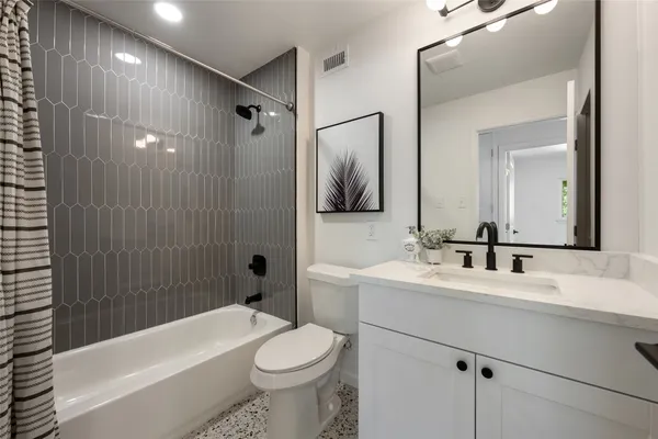 a backyard of a house with yard and outdoor seating