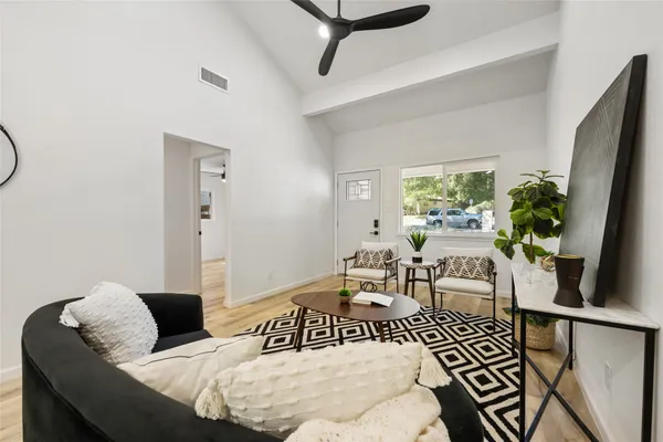 a view of house with backyard porch and furniture