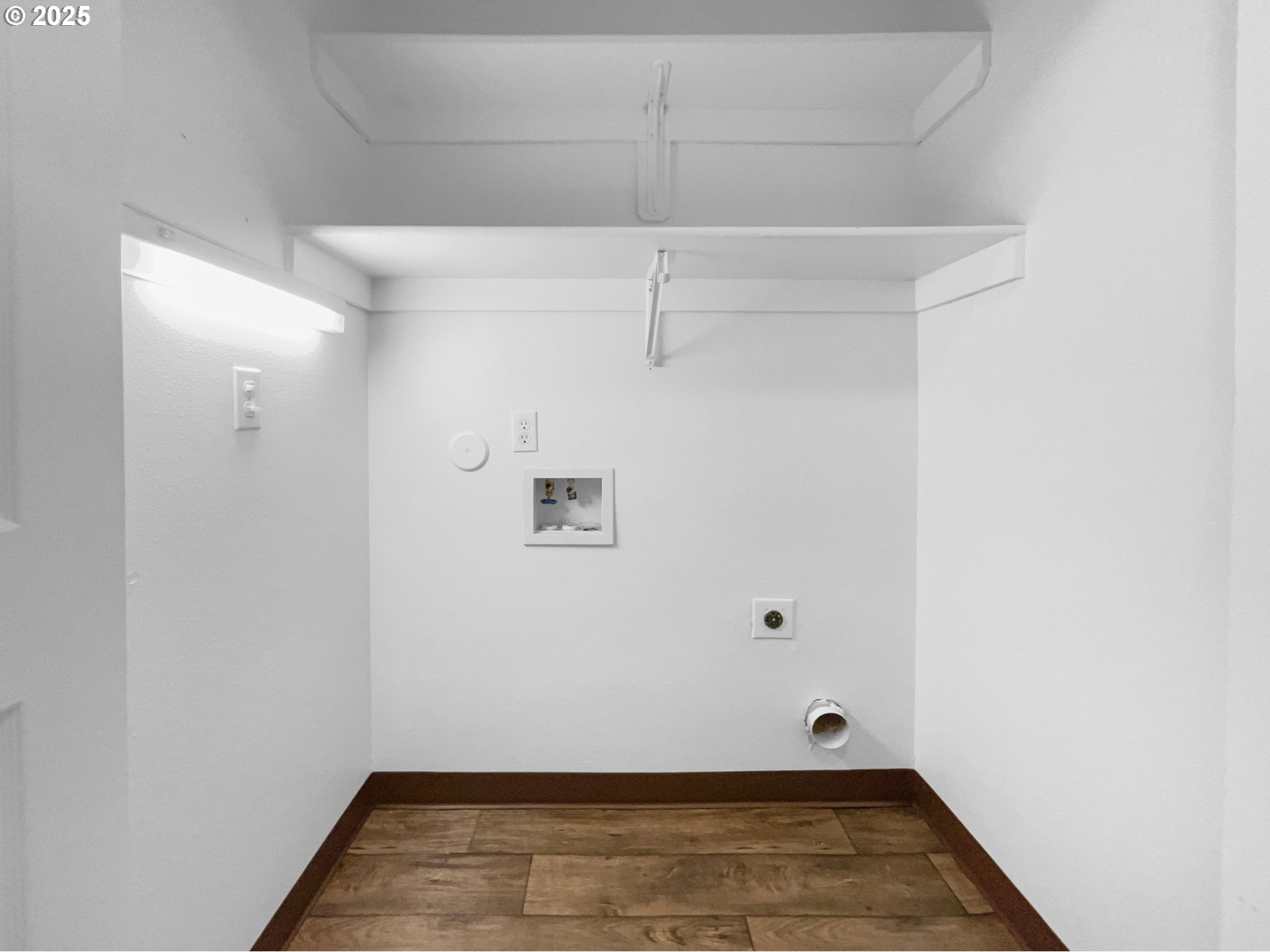 4606 West Powell Boulevard, Unit 163 Gresham, OR 97030 - Photo 11 of 19 a view of a room with wooden floor