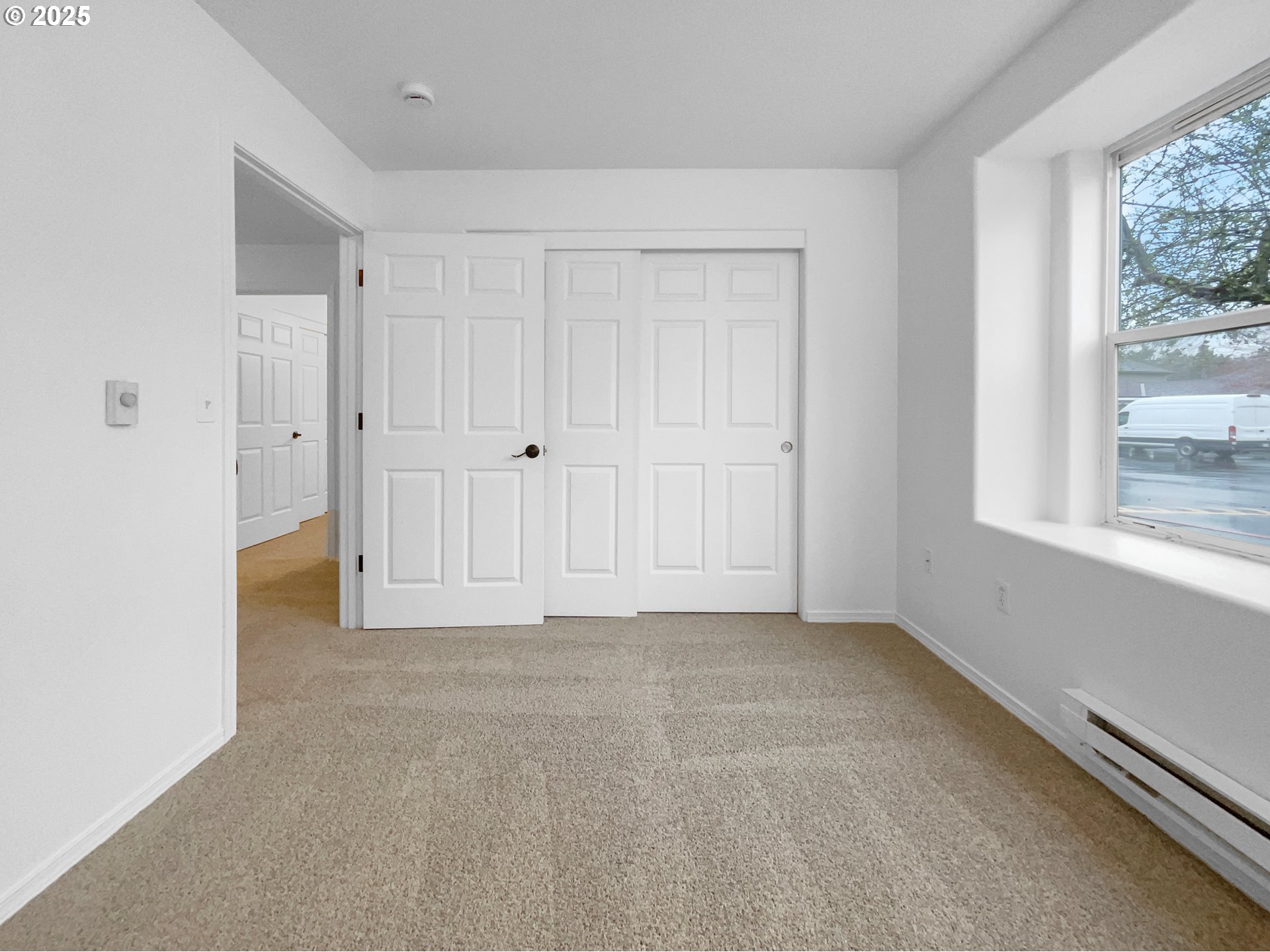 4606 West Powell Boulevard, Unit 163 Gresham, OR 97030 - Photo 9 of 19 a view of an empty room with a window