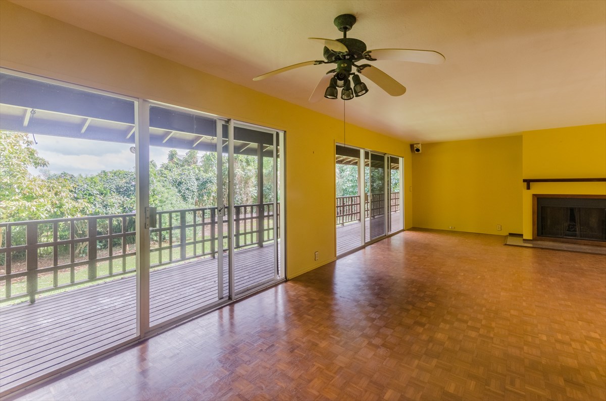 4110 Koloa Road Koloa, HI 96756 - Photo 16 of 18 a view of empty room with wooden floor and fan