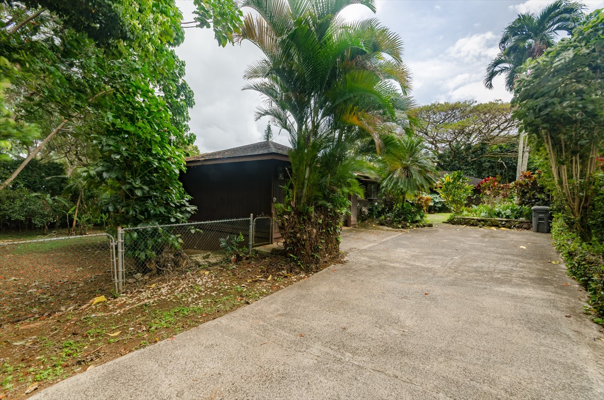 4110 Koloa Road Koloa, HI 96756 - Photo 10 of 18 a backyard of a house with lots of green space