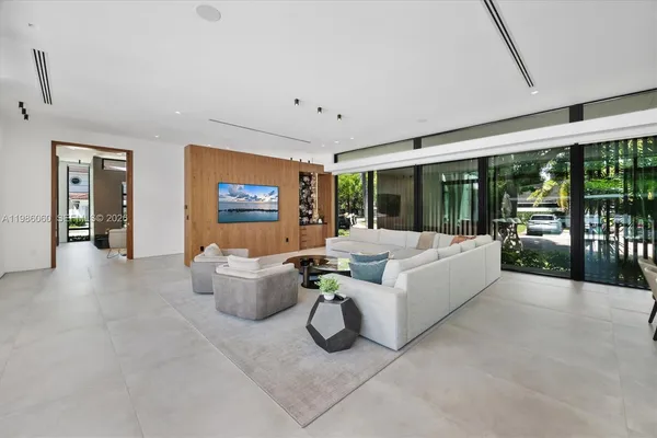 a kitchen with stainless steel appliances a refrigerator and a stove top oven