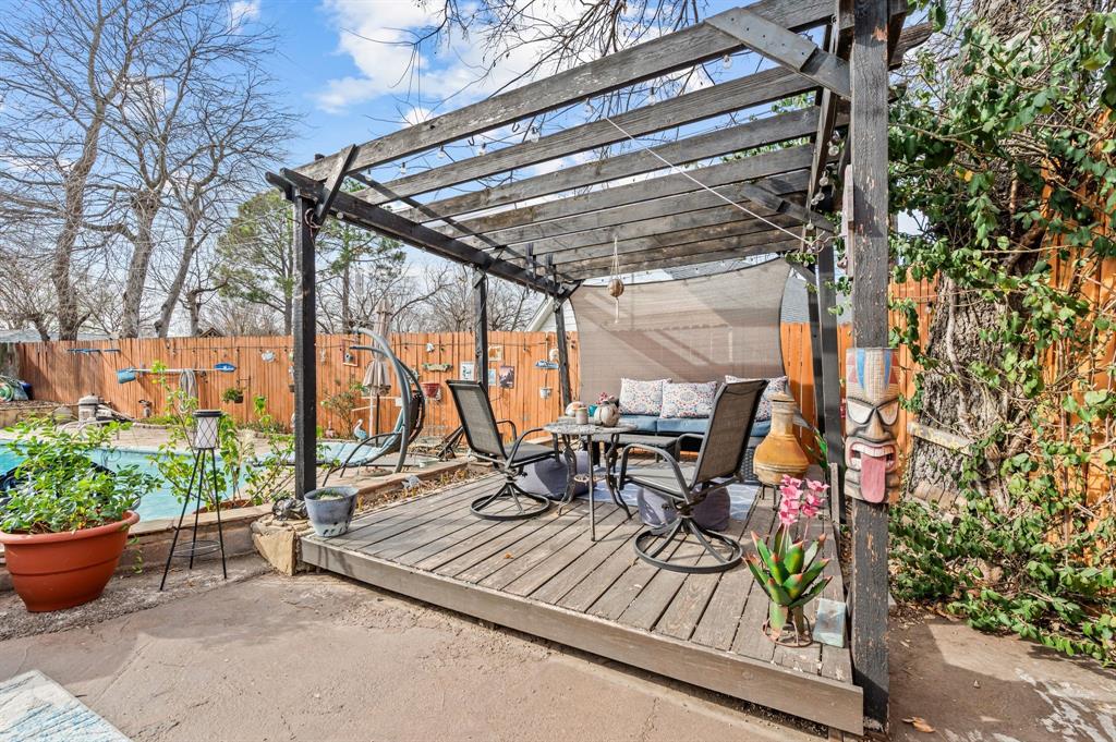 2125 Shady Brook Drive Bedford, TX 76021 - Photo 21 of 24 a view of chairs and tables in the patio