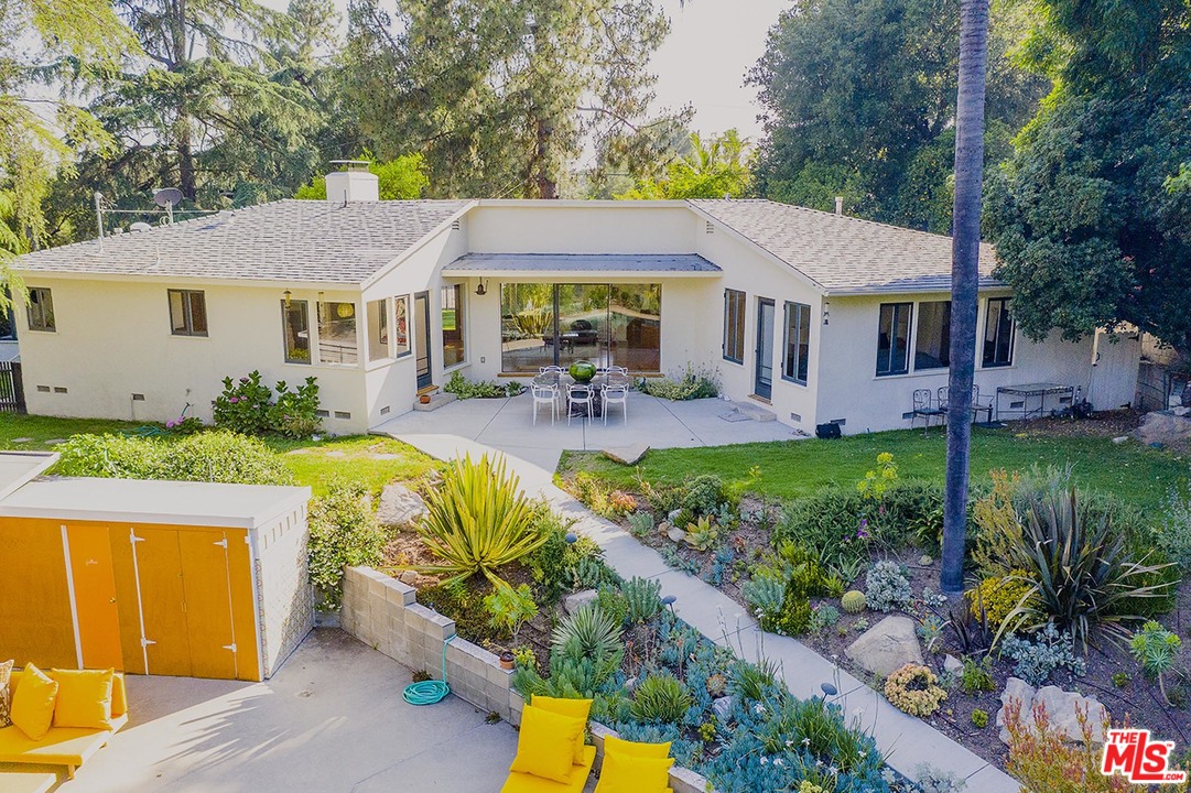 1081 Alta Pine Drive Altadena, CA 91001 - Photo 2 of 38 a front view of a house with garden and patio