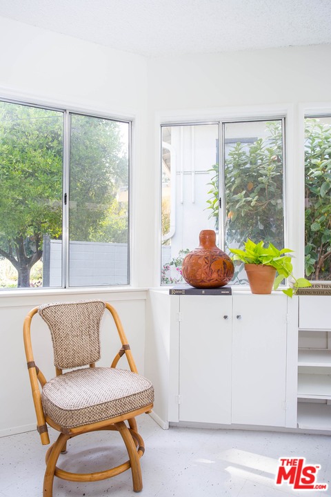 1081 Alta Pine Drive Altadena, CA 91001 - Photo 20 of 38 a room with a table and chairs