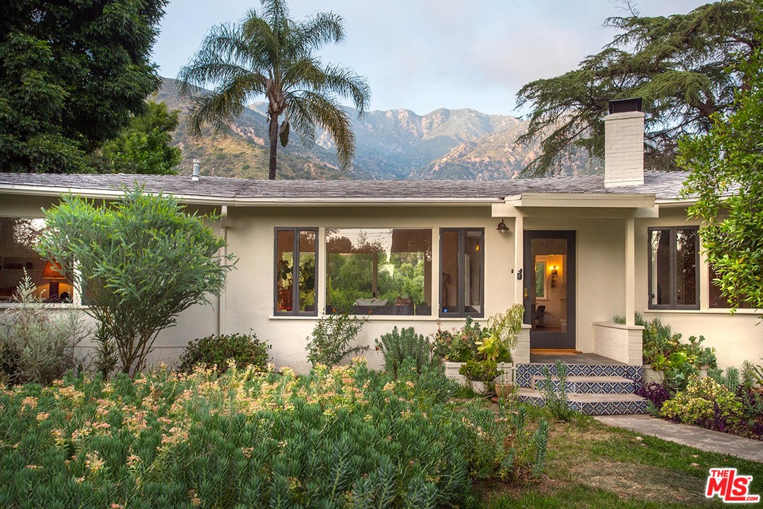 1081 Alta Pine Drive Altadena, CA 91001 - Photo 3 of 38 front view of a house with a yard