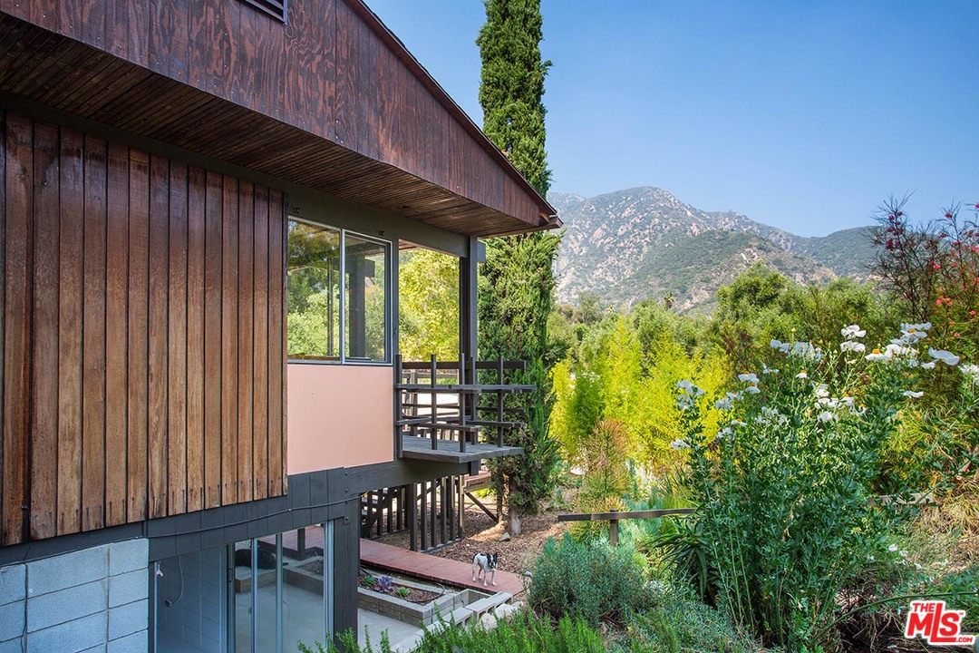 1081 Alta Pine Drive Altadena, CA 91001 - Photo 23 of 38 a view of balcony with table and chairs and potted plants