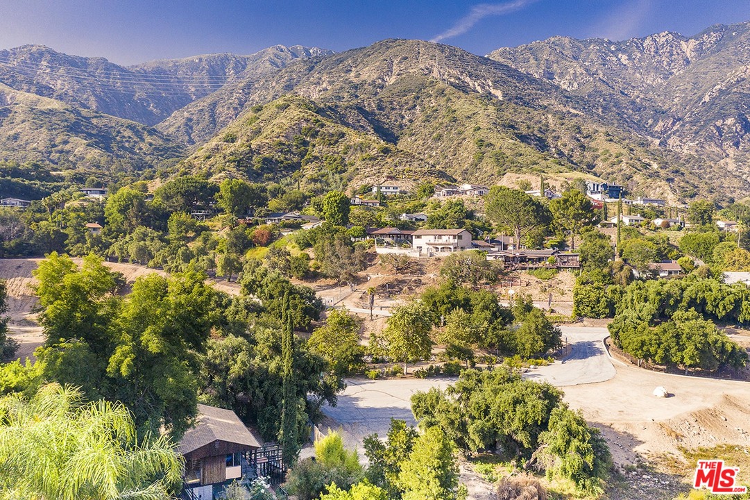 1081 Alta Pine Drive Altadena, CA 91001 - Photo 37 of 38 a view of a houses with a yard
