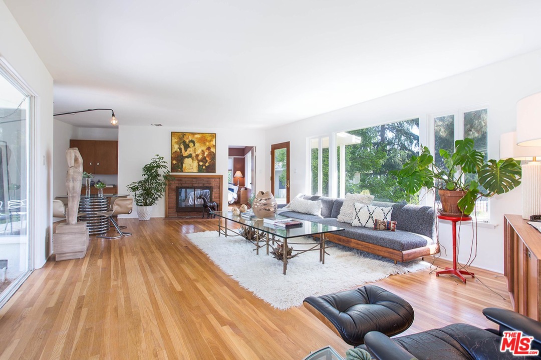 1081 Alta Pine Drive Altadena, CA 91001 - Photo 5 of 38 a living room with furniture and a wooden floor