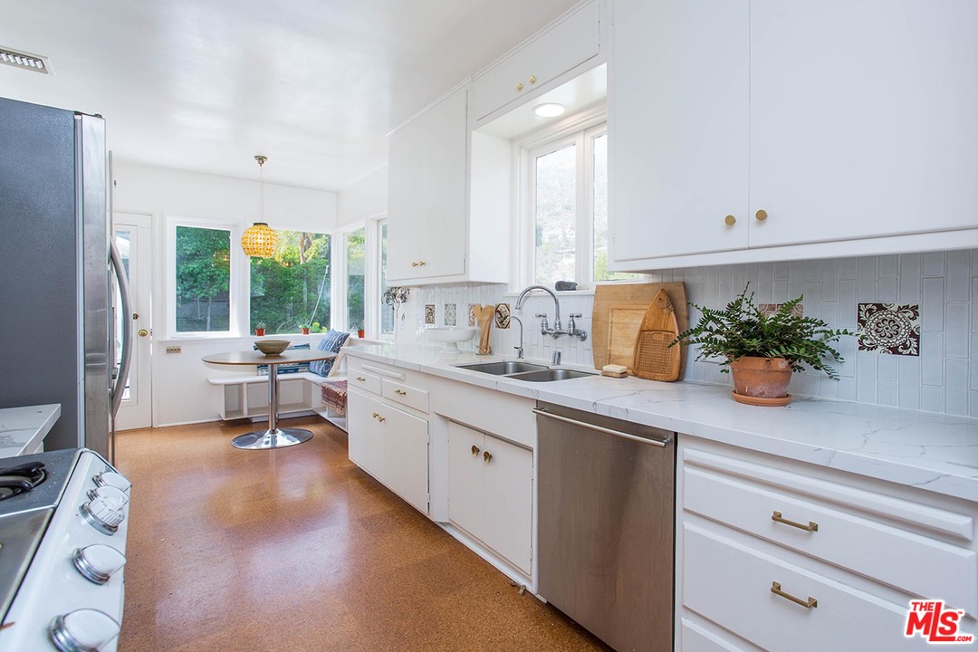 1081 Alta Pine Drive Altadena, CA 91001 - Photo 9 of 38 a kitchen with sink and cabinets