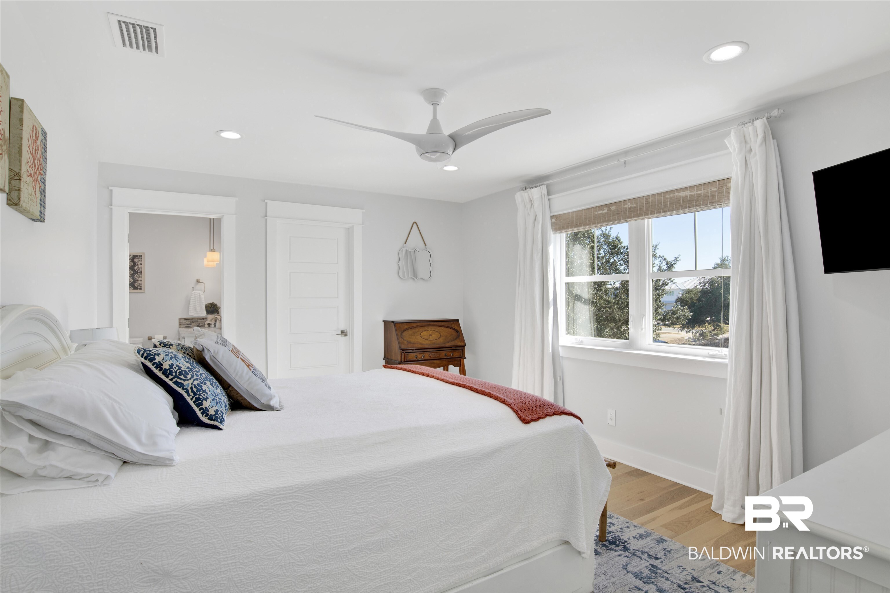 32937 River Road Orange Beach, AL 36561 - Photo 28 of 42 Bedroom with ceiling fan and light hardwood / wood-style flooring