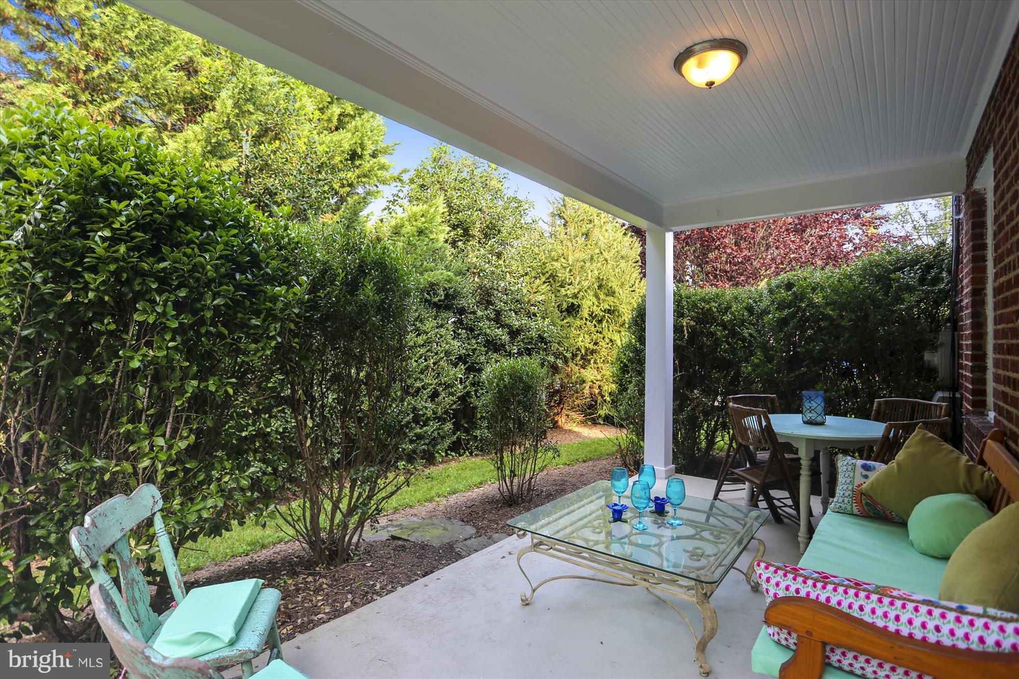 218 Normandy Drive Silver Spring, MD 20901 - Photo 16 of 29 Side porch, morning paper and coffee?