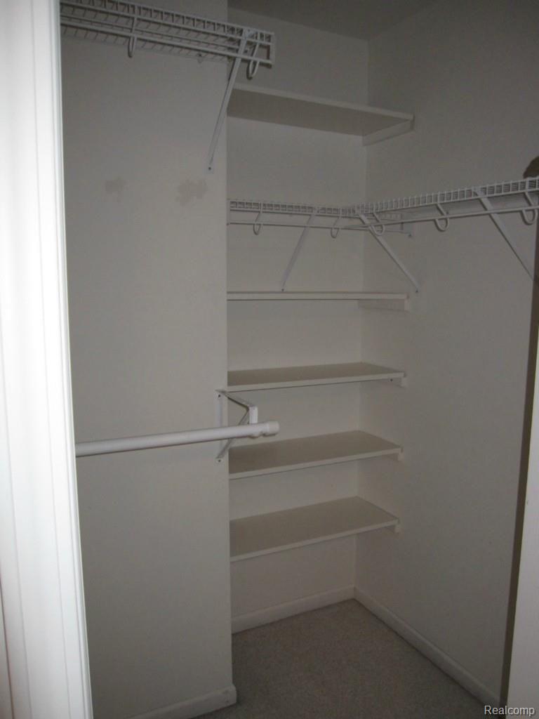 41687 Glade Road, Unit 34 Canton, MI 48187 - Photo 15 of 19 Master Closet Glade.jpg