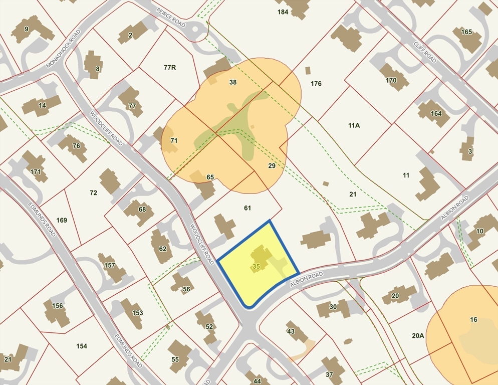 35 Albion Road Wellesley, MA 02481 - Photo 3 of 5 a bedroom with a bed and a painting on the wall