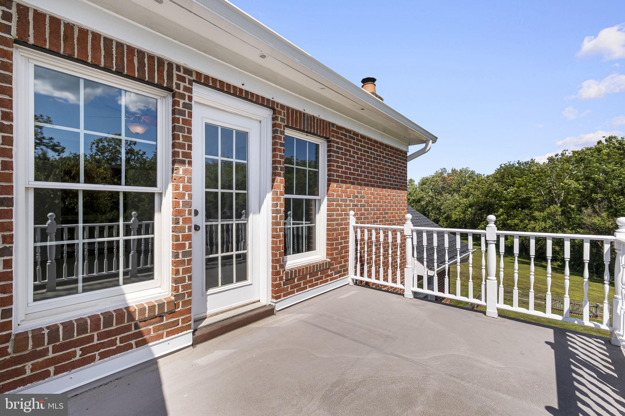 15906 Barnesville Road Boyds, MD 20841 - Photo 12 of 57 a view of a house with a large window