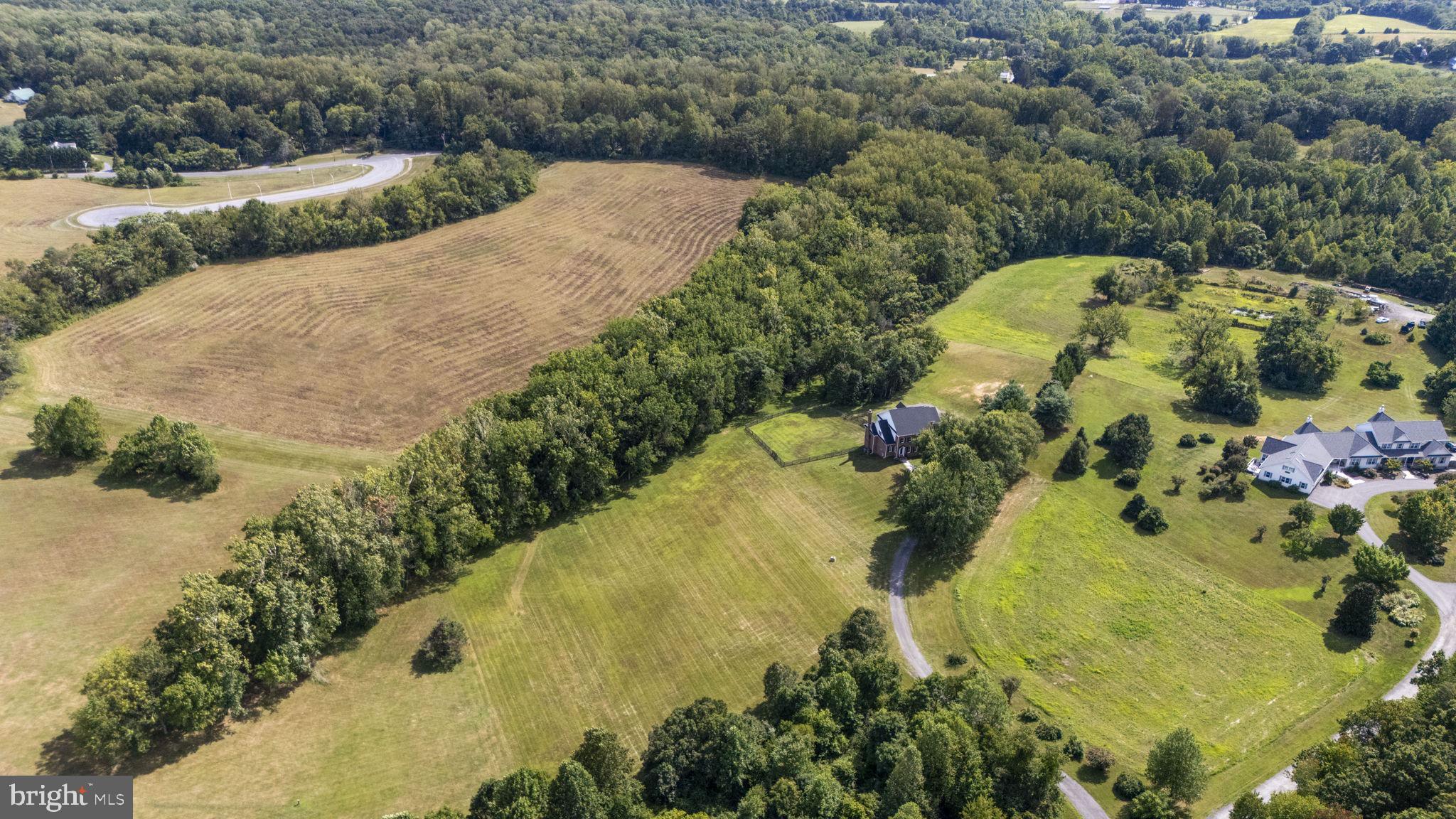 15906 Barnesville Road Boyds, MD 20841 - Photo 54 of 57 an aerial view of a residential houses with outdoor space