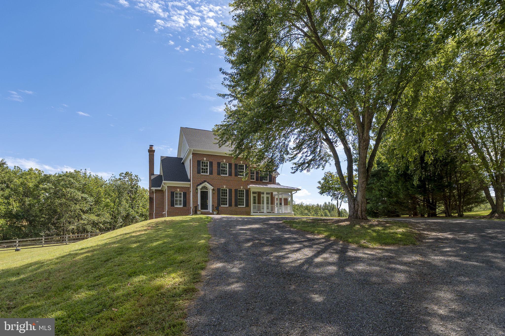 15906 Barnesville Road Boyds, MD 20841 - Photo 56 of 57 a front view of a house with a yard