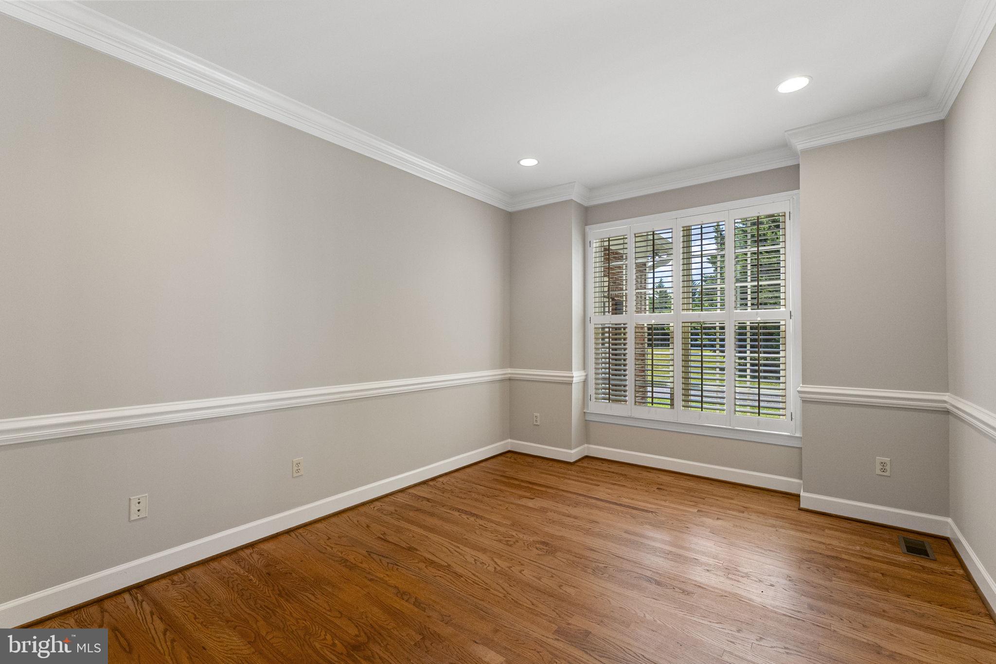 15906 Barnesville Road Boyds, MD 20841 - Photo 8 of 57 an empty room with wooden floor and windows