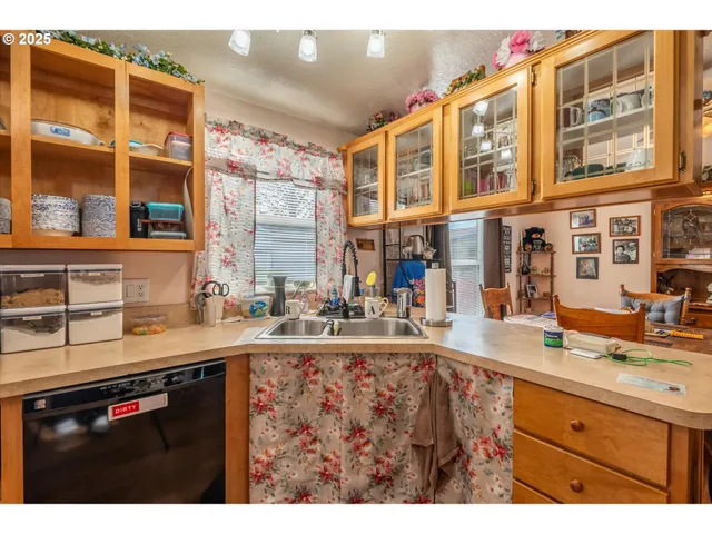 a kitchen with a sink and a window