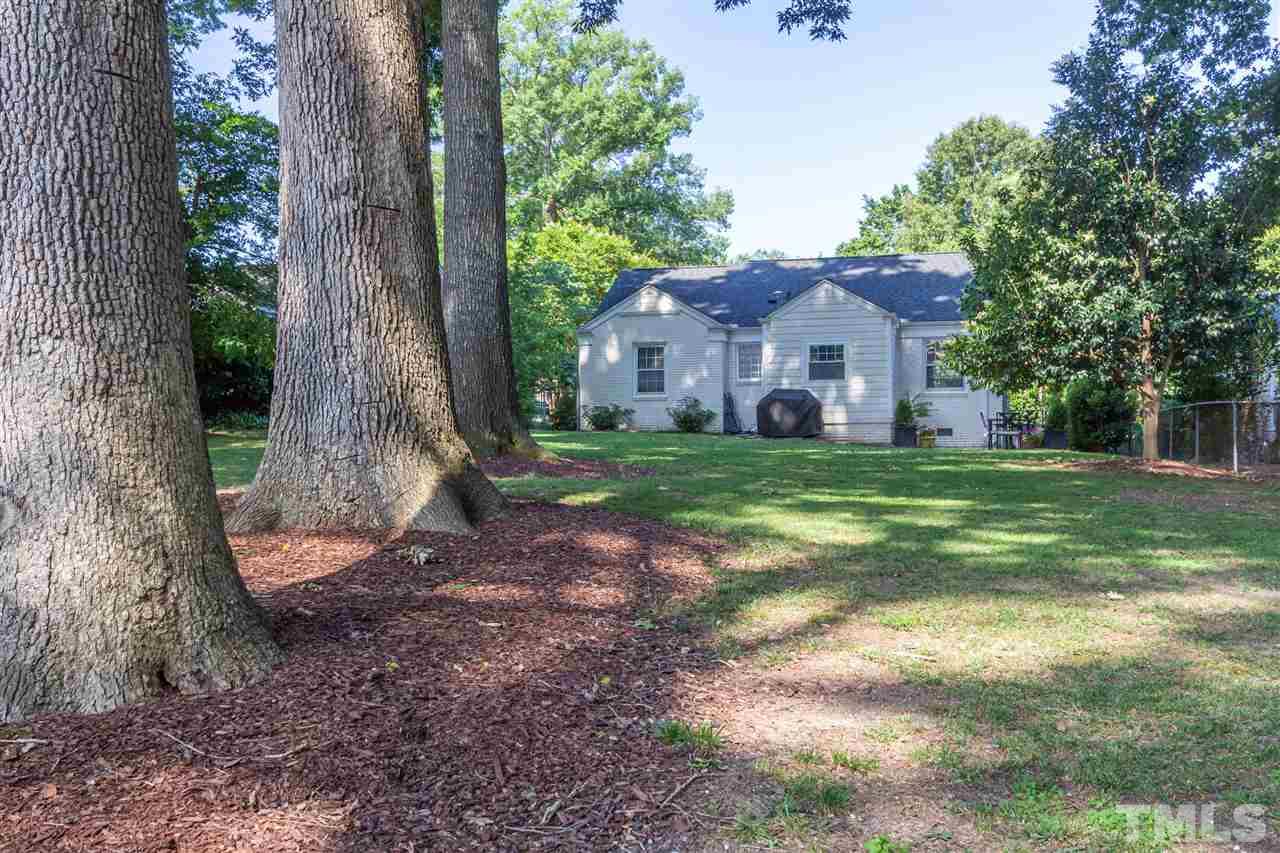 1230 Clifton Street Raleigh, NC 27604 - Photo 17 of 19 a view of a house with a yard