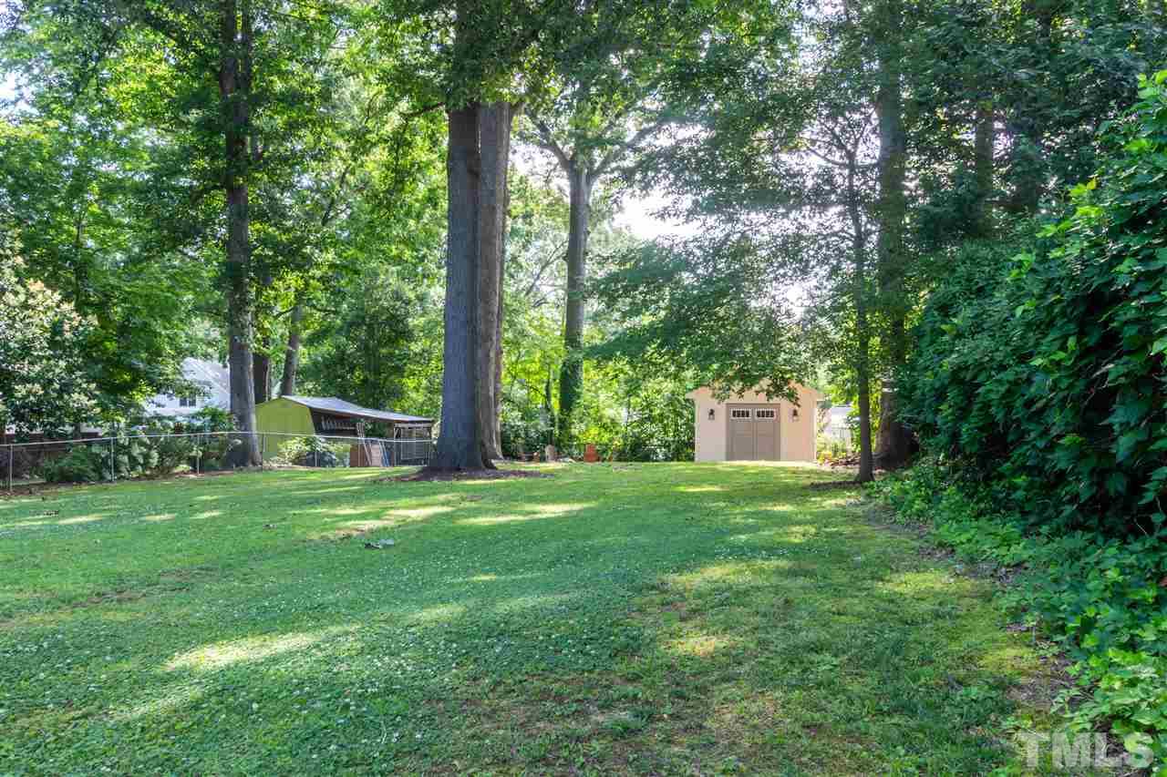 1230 Clifton Street Raleigh, NC 27604 - Photo 19 of 19 a house with a tree in front of it