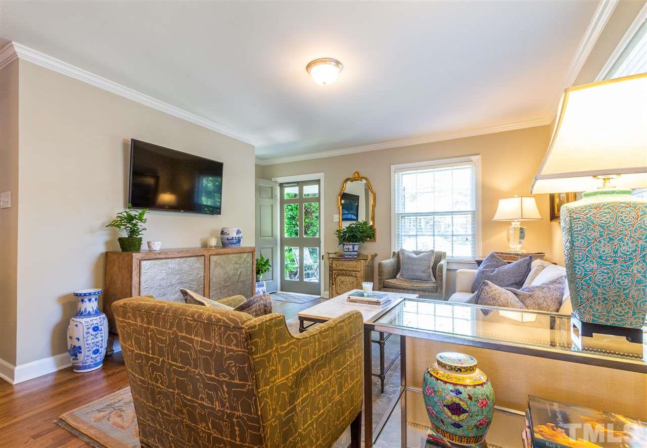 1230 Clifton Street Raleigh, NC 27604 - Photo 3 of 19 a living room with furniture and a flat screen tv