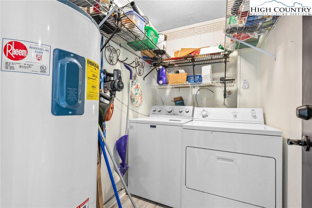 301 Pinnacle Inn Road, Unit 3207 Beech Mountain, NC 28604 - Photo 23 of 37 a utility room with dryer and washer