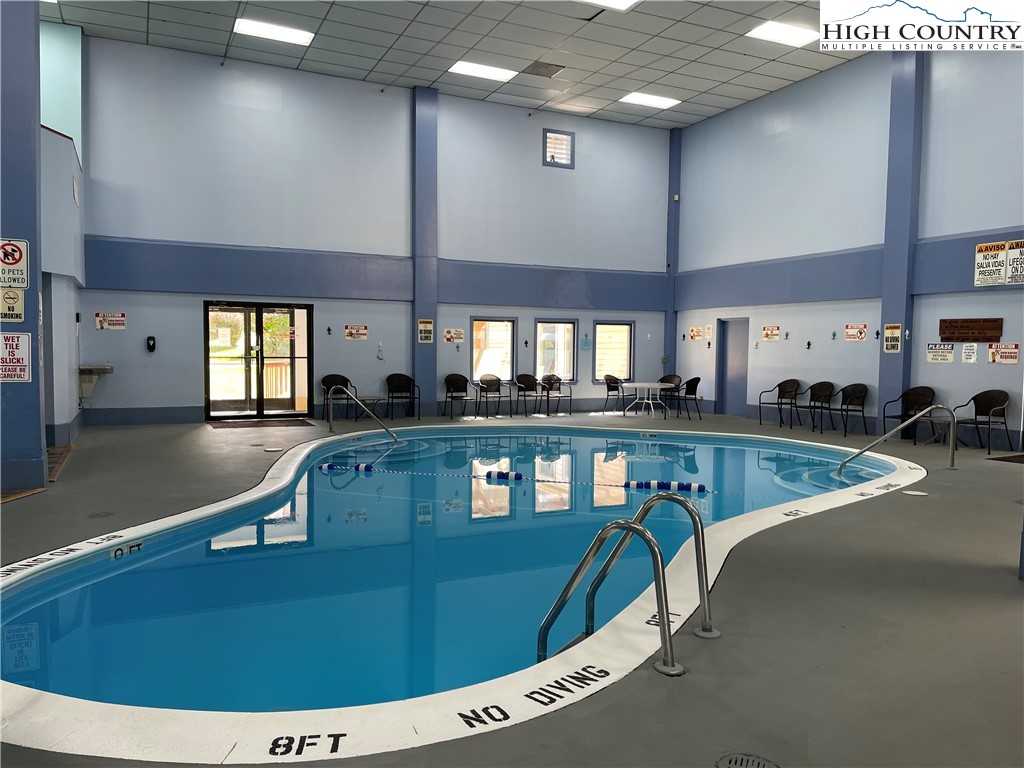 301 Pinnacle Inn Road, Unit 3207 Beech Mountain, NC 28604 - Photo 30 of 37 a view of a swimming pool kitchen