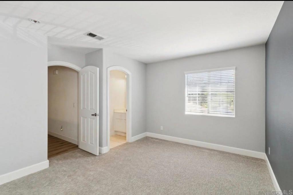 1234 Old Janal Ranch Road Chula Vista, CA 91915 - Photo 25 of 34 an empty room with a window