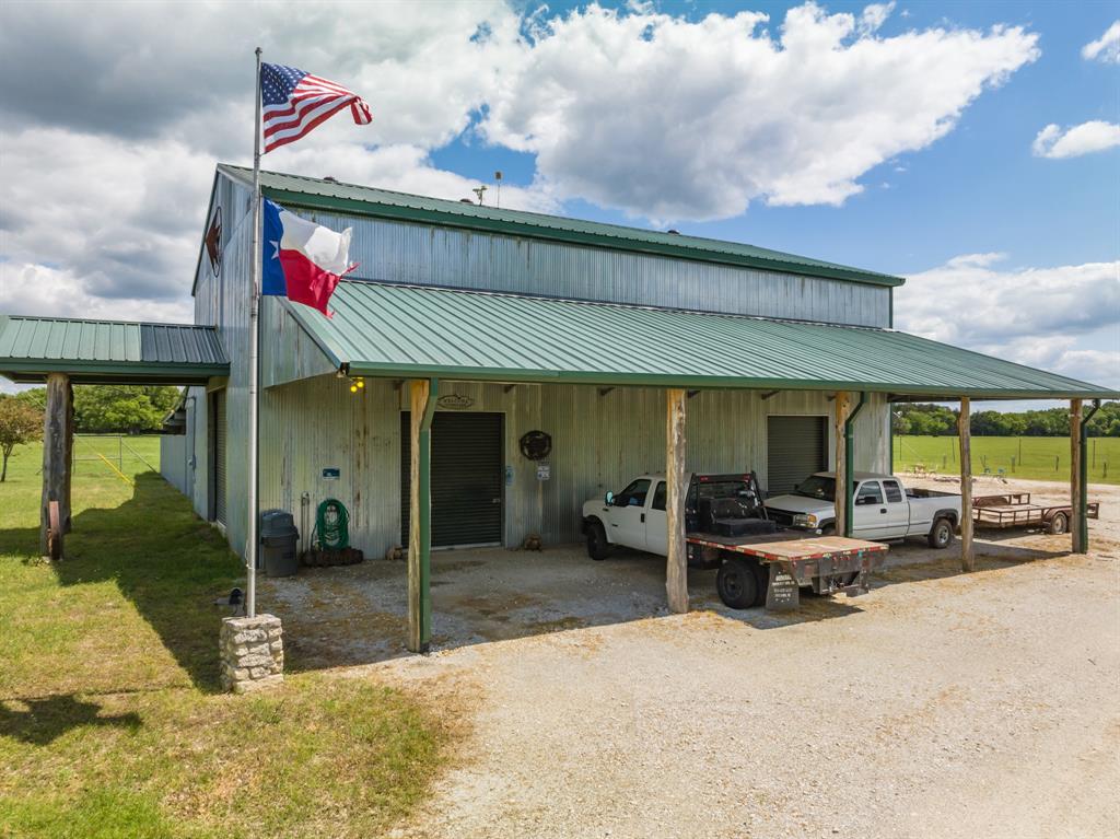 Tbd Fcr 920 Mexia, TX 76667 - Photo 11 of 34 a view of a patio with table and chairs under an umbrella