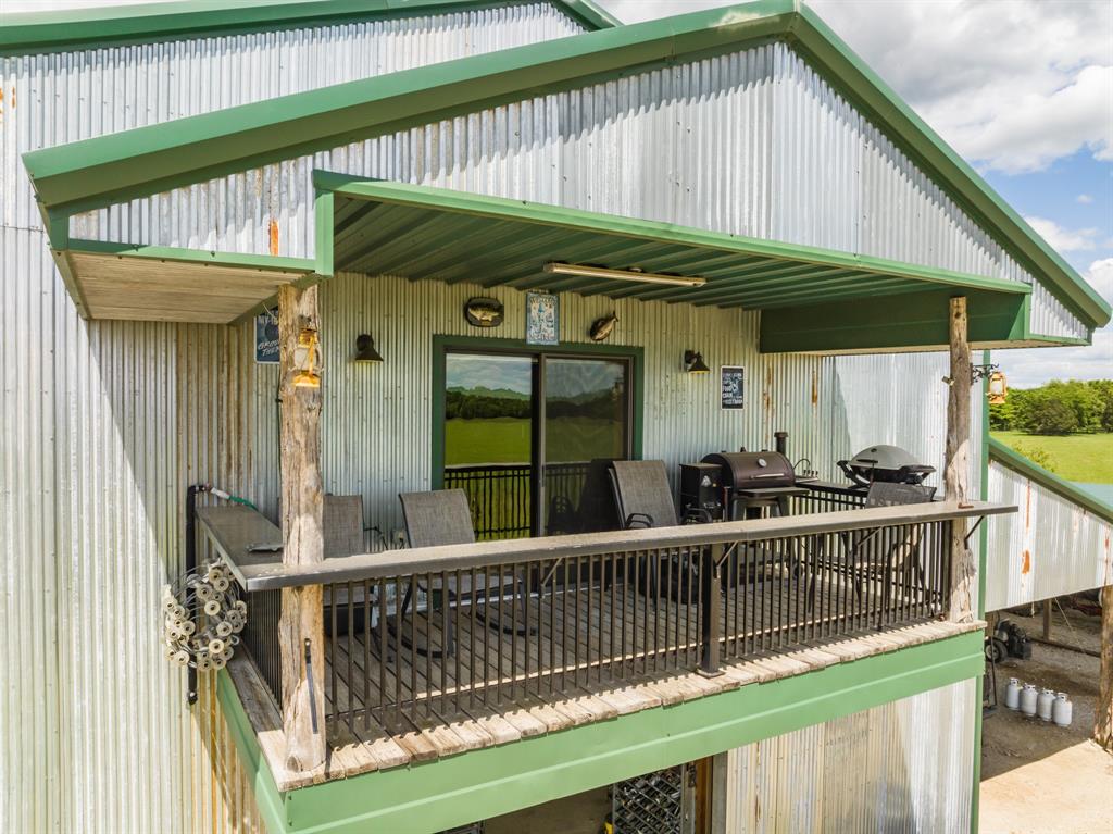 Tbd Fcr 920 Mexia, TX 76667 - Photo 13 of 34 a view of a house with a small deck and furniture