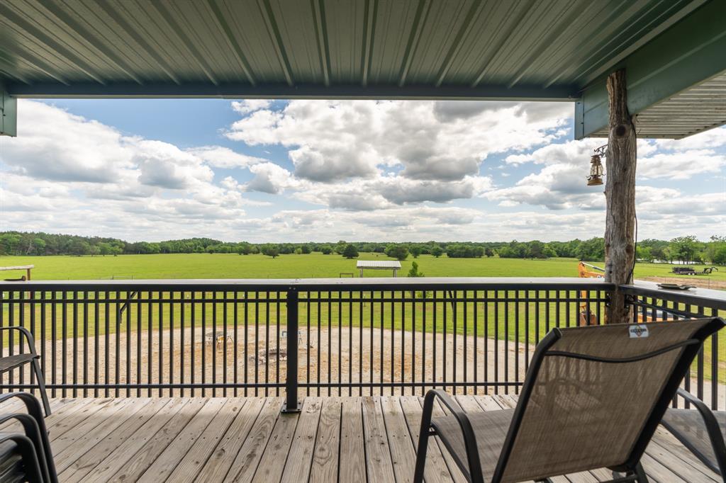 Tbd Fcr 920 Mexia, TX 76667 - Photo 14 of 34 a view of a balcony with wooden floor & fence