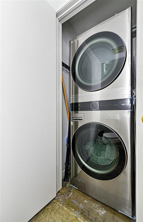 1001 Belleview Street, Unit 104 Dallas, TX 75215 - Photo 13 of 22 a utility room with dryer and washer