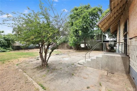 a house view with a backyard