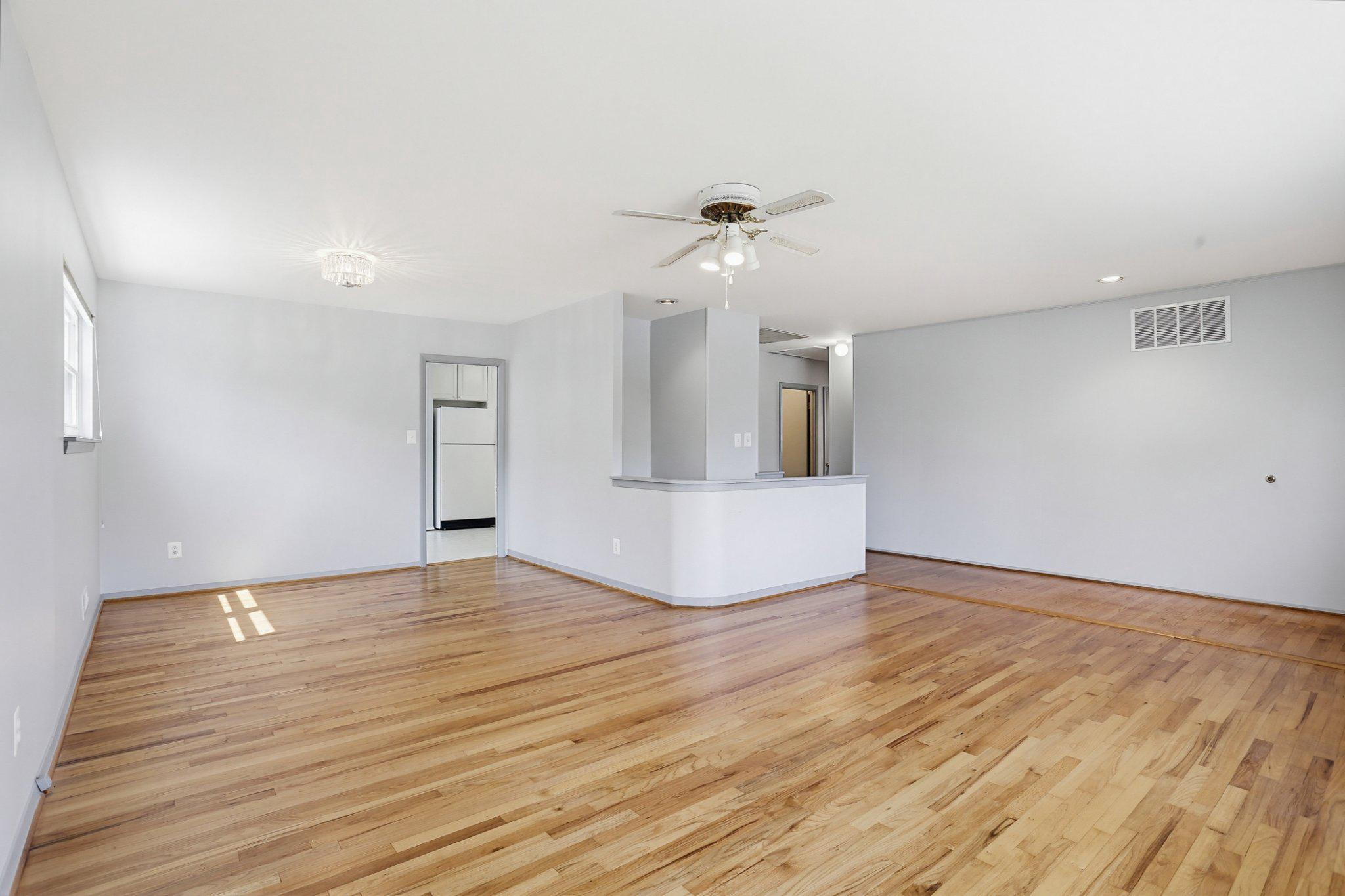 8145 Scotts Level Road Pikesville, MD 21208 - Photo 5 of 45 Spacious, sunlit living area awaits.