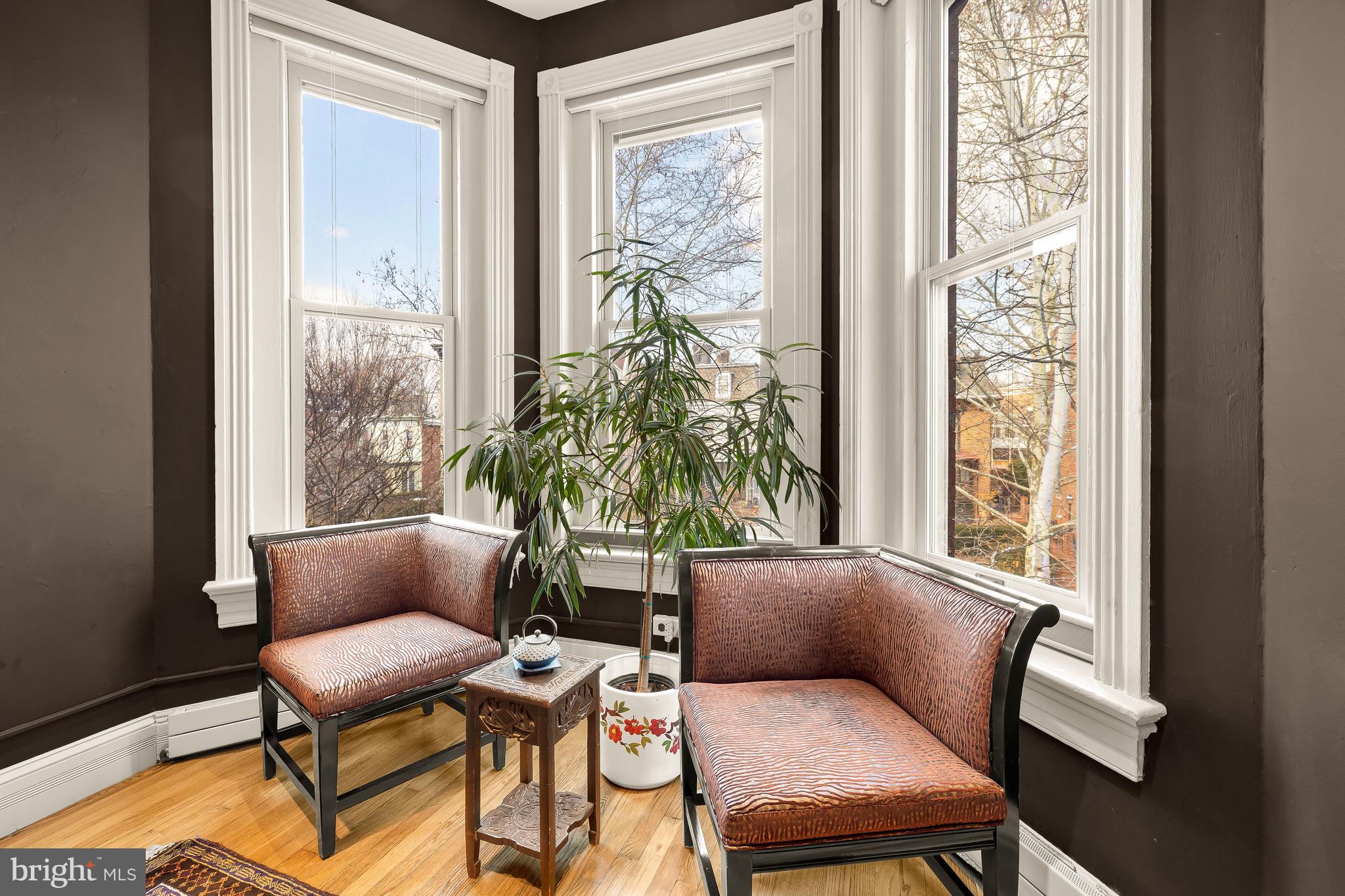 1436 Q Street Northwest Washington, DC 20009 - Photo 20 of 45 a living room with furniture and a window