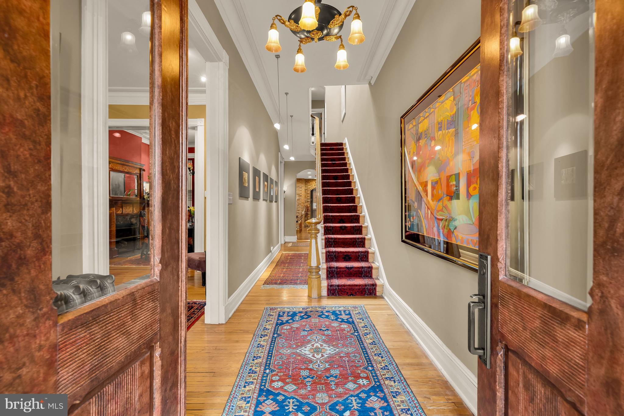 1436 Q Street Northwest Washington, DC 20009 - Photo 2 of 45 a view of entryway with furniture and wooden floor