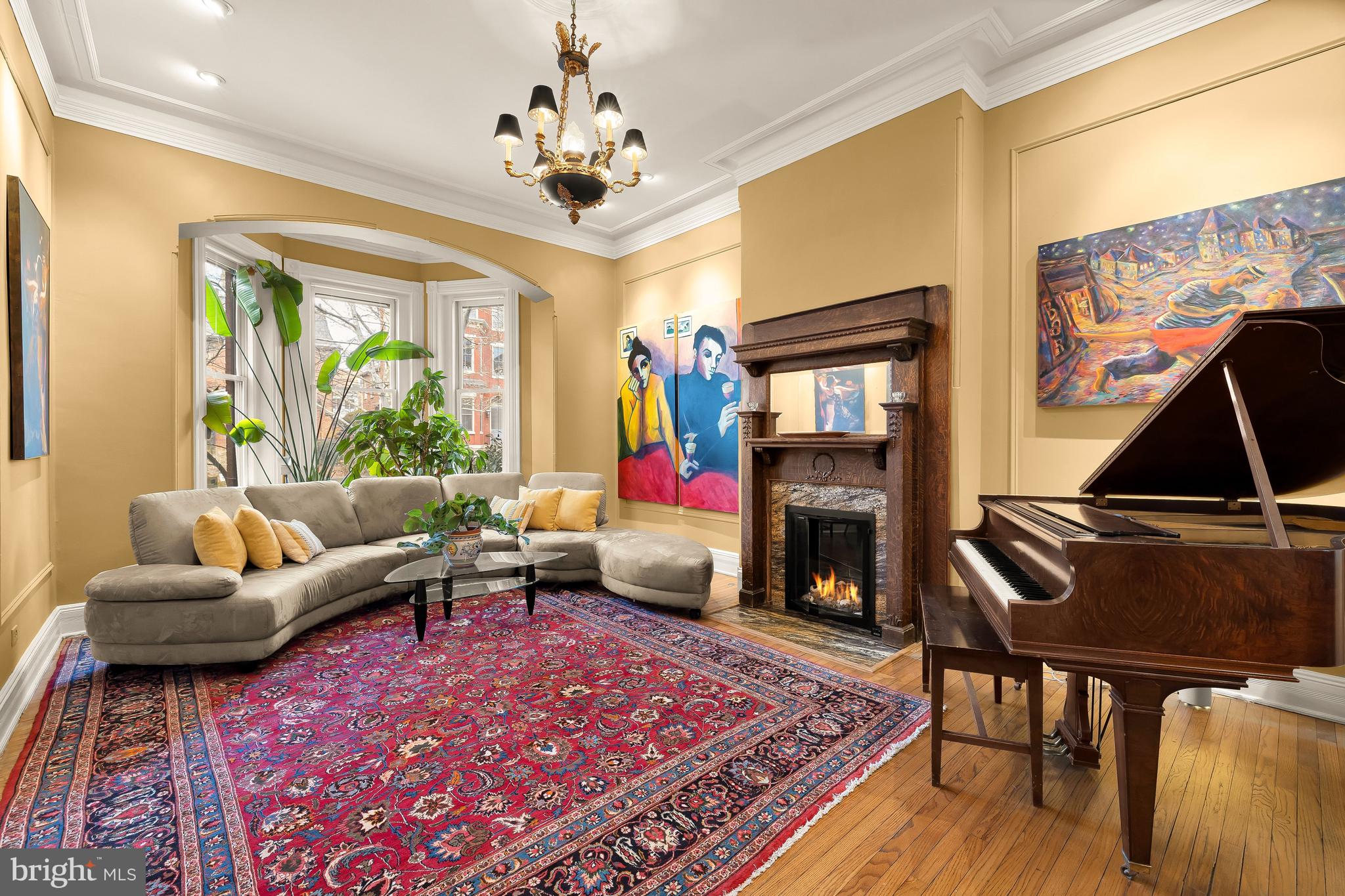 1436 Q Street Northwest Washington, DC 20009 - Photo 5 of 45 a living room with furniture and a fireplace