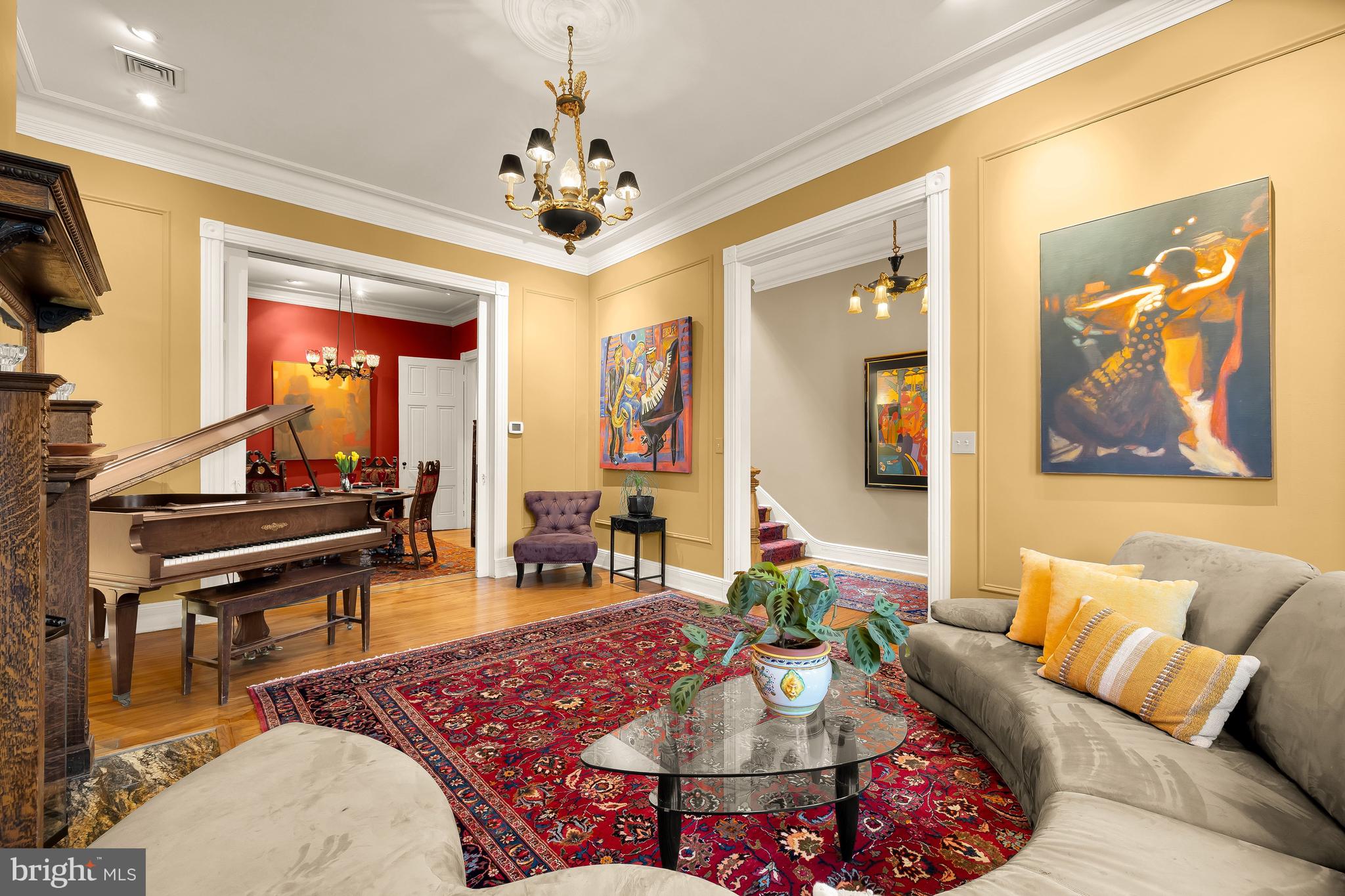 1436 Q Street Northwest Washington, DC 20009 - Photo 9 of 45 a living room with furniture and a chandelier